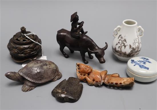 A small Chinese bronze censer, soapstone carvings, vase etc